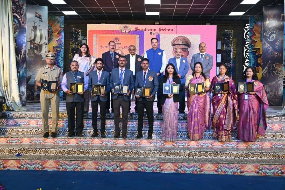 An award ceremony on stage at Sunbeam School Ballia.